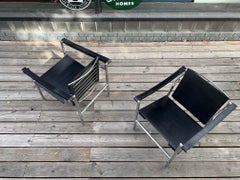 Pair of Cassina "LC1" Armchairs in Black Leather and Chrome