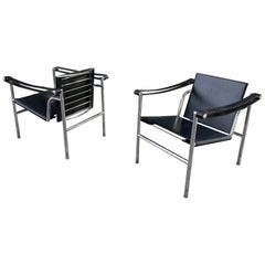 Pair of Cassina "LC1" Armchairs in Black Leather and Chrome