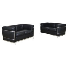 Pair of Cassina Lc2 Two Seater Sofas by Charlotte Perriand and Le Corbusier