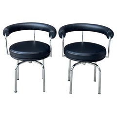 Pair of Cassina LC7 Swivel Chairs by Le Corbusier, Perriand & Jeanneret, Signed