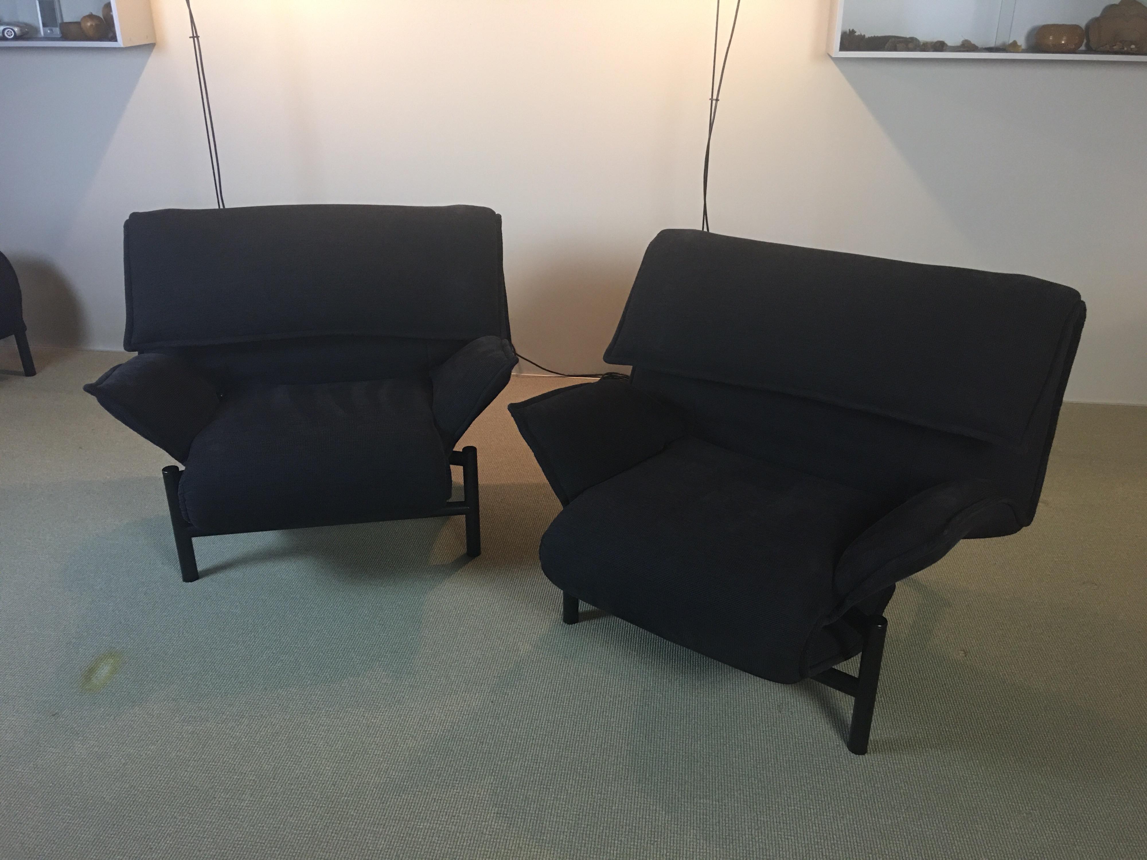 Pair of Veranda 123 adjustable lounge chairs designed by Vico Magistretti. Chairs have folding backs and adjustable in 3 different positions. Polyurethane foam over steel construction with frame and legs in matte black enameled steel. Design dates
