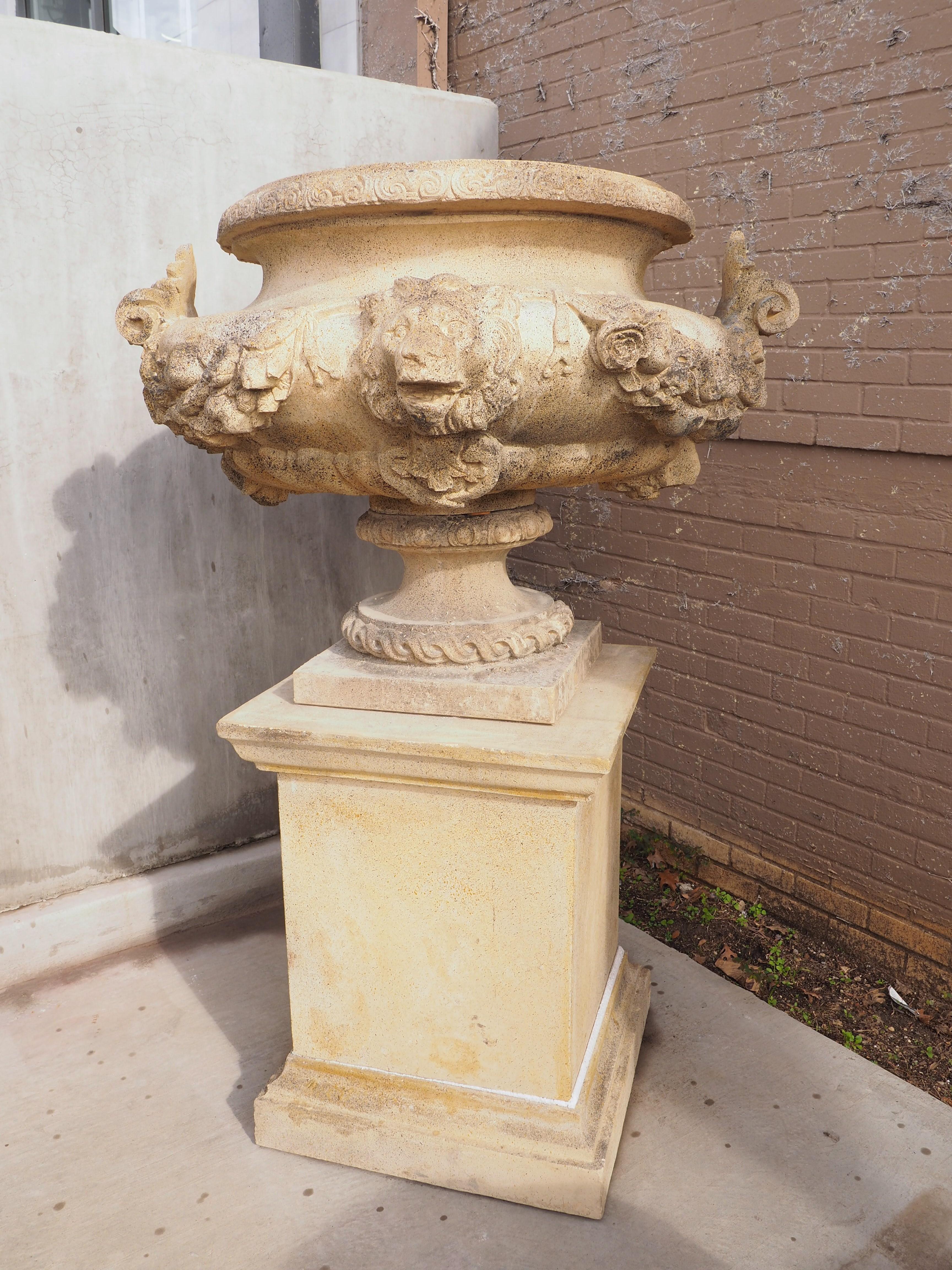 Pair of Cast and Patinated Stone French Lion Vases on 3-Piece Plinths In Good Condition In Dallas, TX
