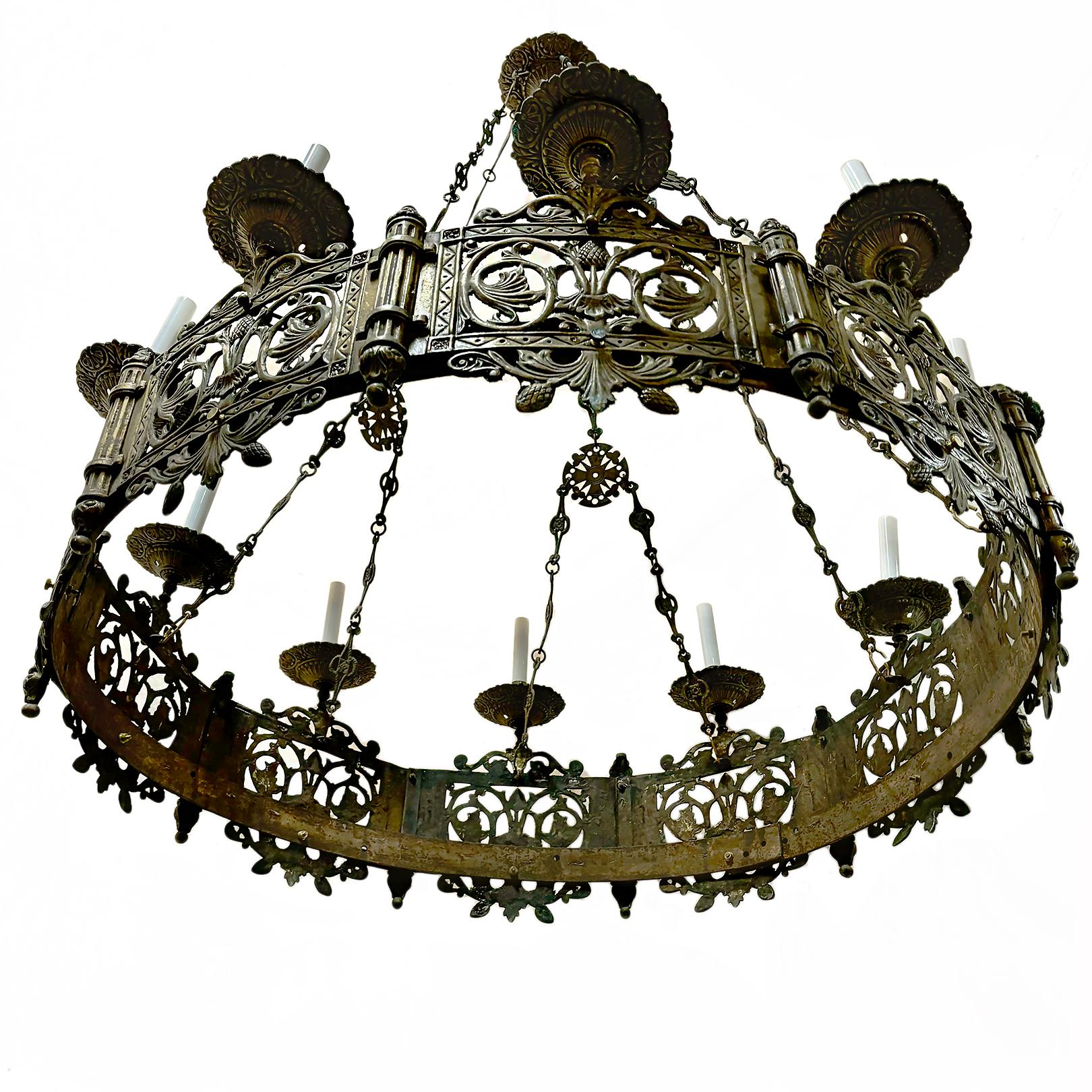 Pair of circa 1900 English ten-light bronze chandeliers with thistle & foliage motif on body and original patina. Sold individually.

Measurements:
Diameter: 41