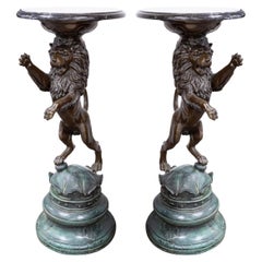 Pair of Cast Bronze Lion Sculptures with Marble Tops After P.J. Mene