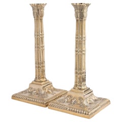 Pair of cast cluster column candlesticks by Martin, Hall & Co Ltd, 1850-75