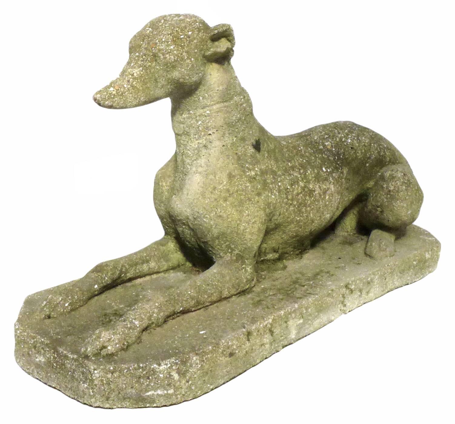 A perfect pair of cast concrete greyhound or whippet statues. Wonderfully worn and colored from years of life outdoors, a Classic garden or entryway figural motif great for use indoors or out.