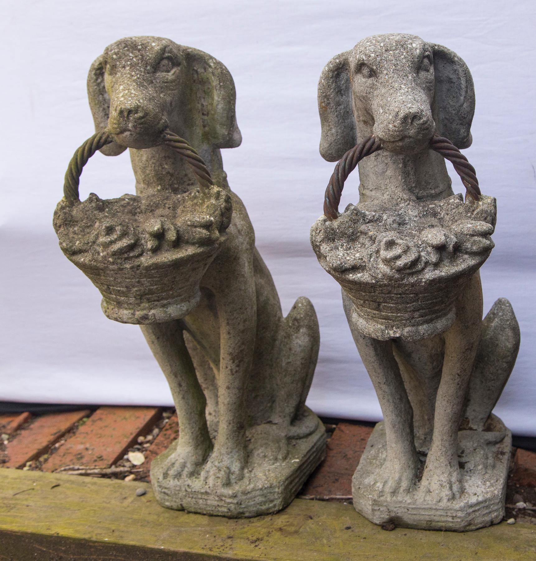 Each hound holds a basket of flowers with twisted iron handles.
The bases have cut corners. 
The bases are 8.5 inches deep and 7.5 inches wide. The depth of 16 inches is the overall depth
Weathered surfaces.
 