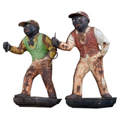 Pair of Cast Iron Americana Lawn Figures