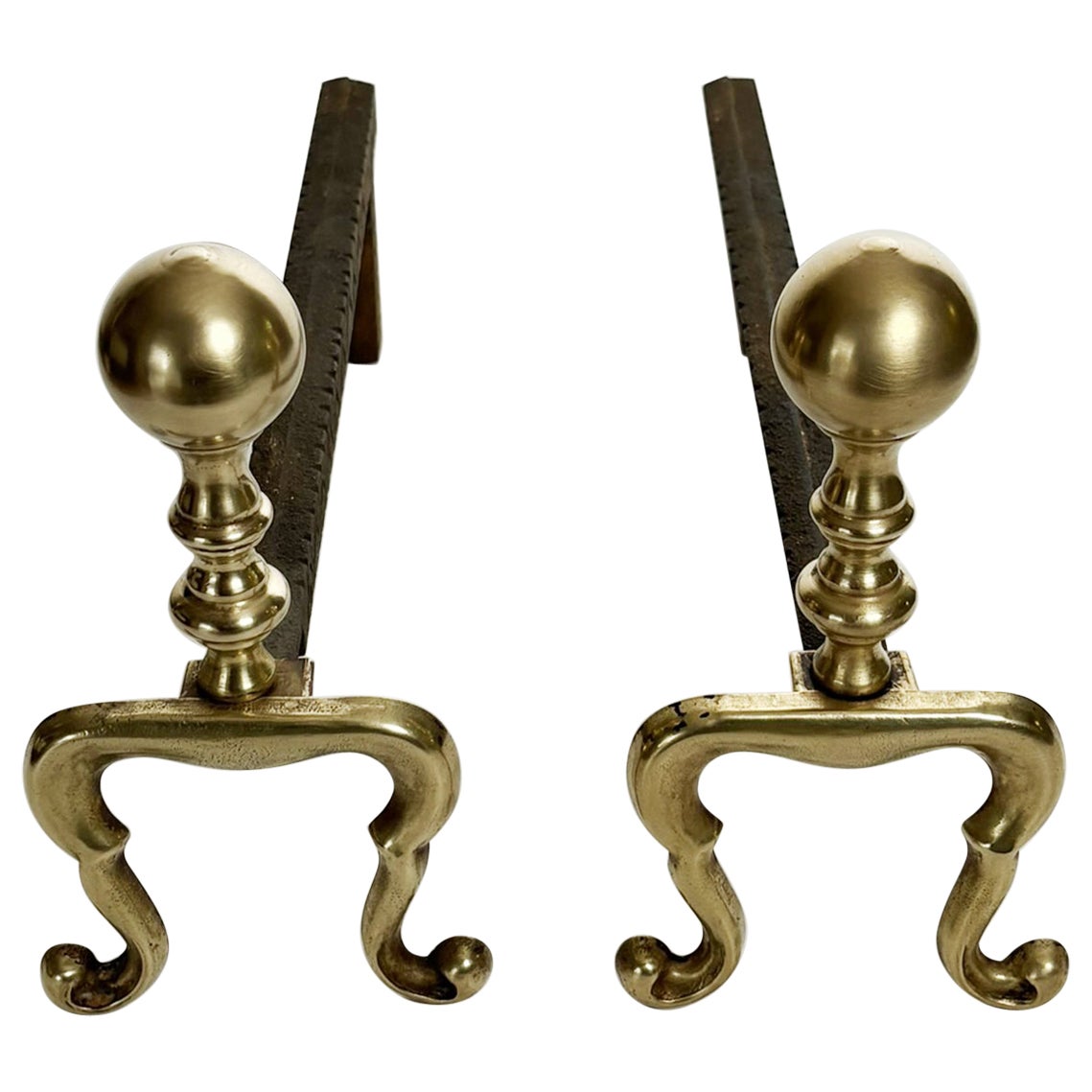 Pair of cast iron and brass andirons, France, 1950
