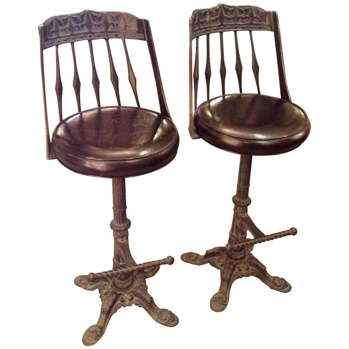 Imbued with an unmistakable heirloom feel, these vintage bar stools have elaborately cast iron bases and plush leather seats. The unique textures and patinas of these pieces add a heritage feel to any bar or breakfast counter. Sold in a set of