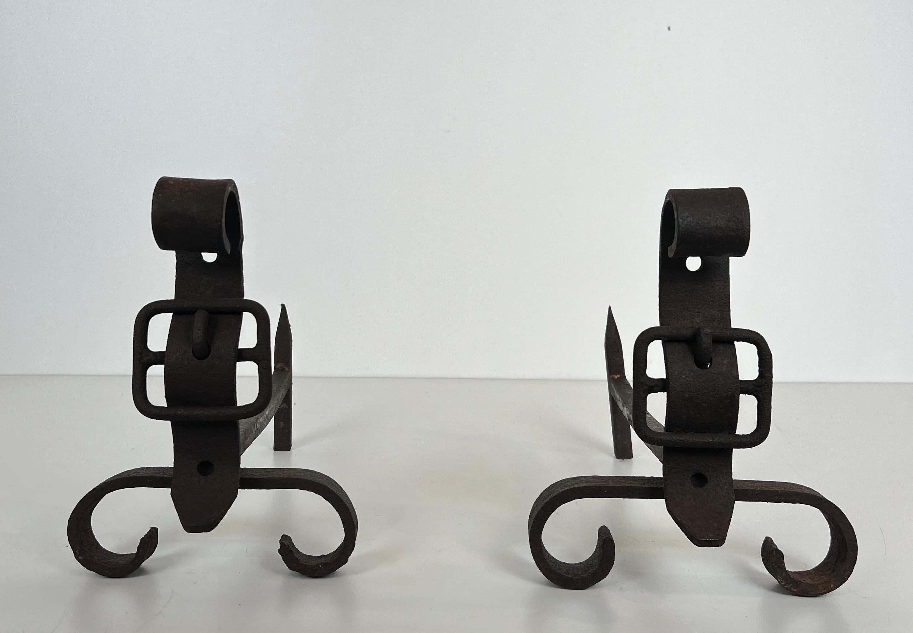 Pair of cast iron and wrought iron andirons representing a belt. French work. For Sale 6