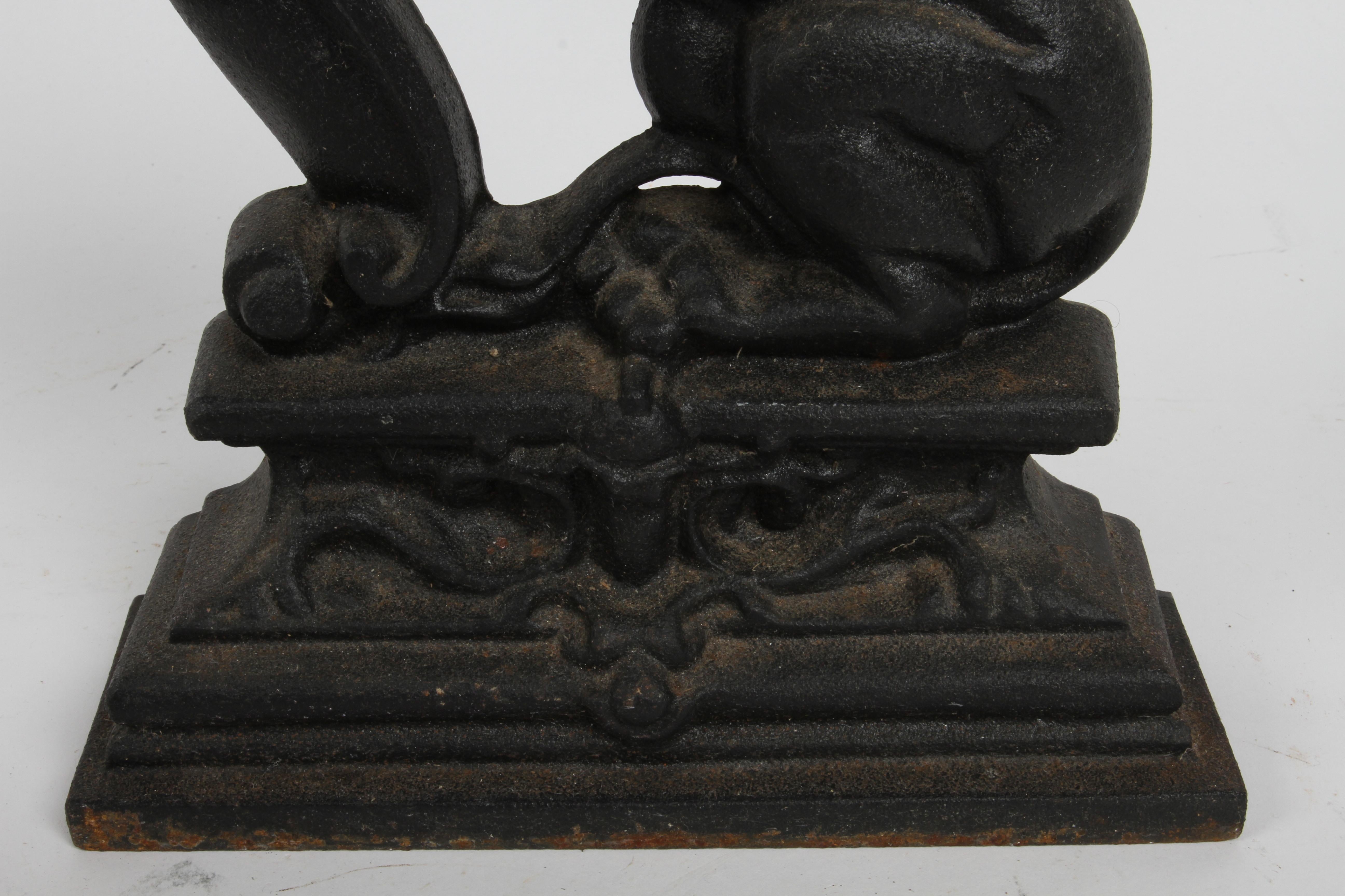 Late 19th Century Pair of Cast Iron Andirons or Fire Dogs of Rampant Lions Resting on Shield