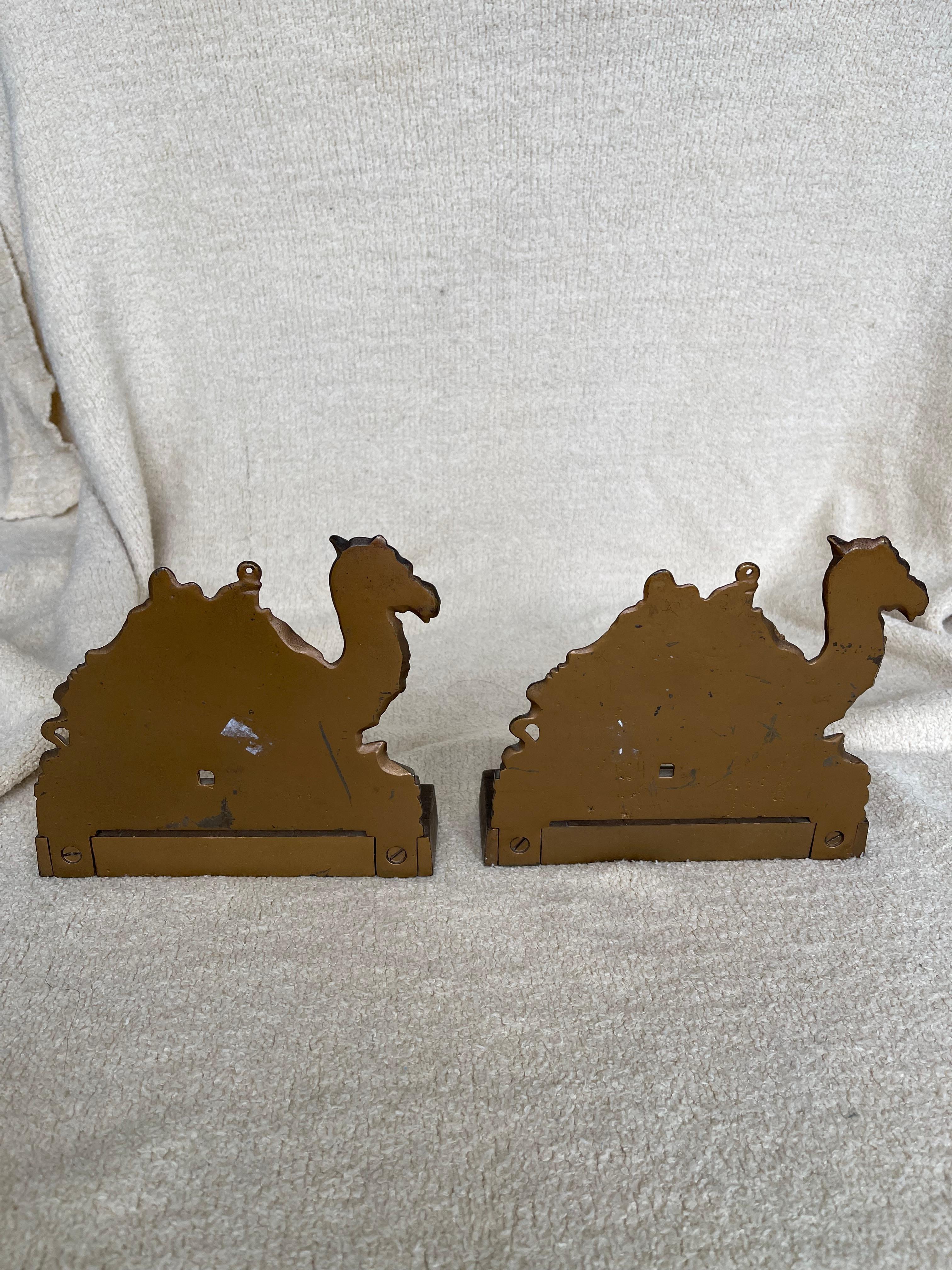 Art Deco Pair of Cast Iron Bookends w/Camels, by Judd Co. ca. 1920 For Sale