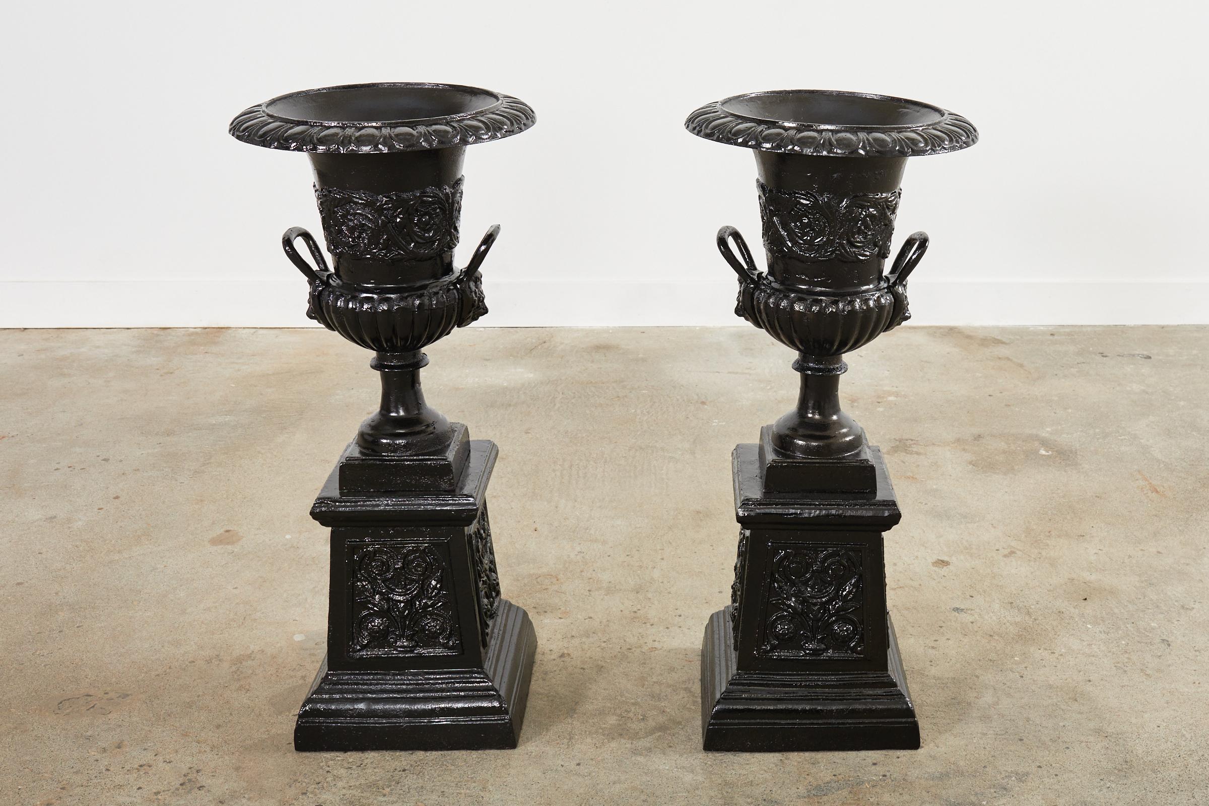 Neoclassical Pair of Cast Iron Campana Form Garden Urns on Stands For Sale
