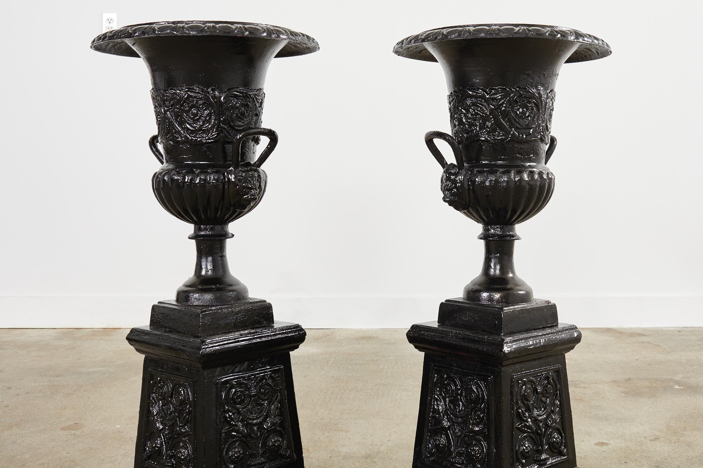 Pair of Cast Iron Campana Form Garden Urns on Stands In Distressed Condition For Sale In Rio Vista, CA