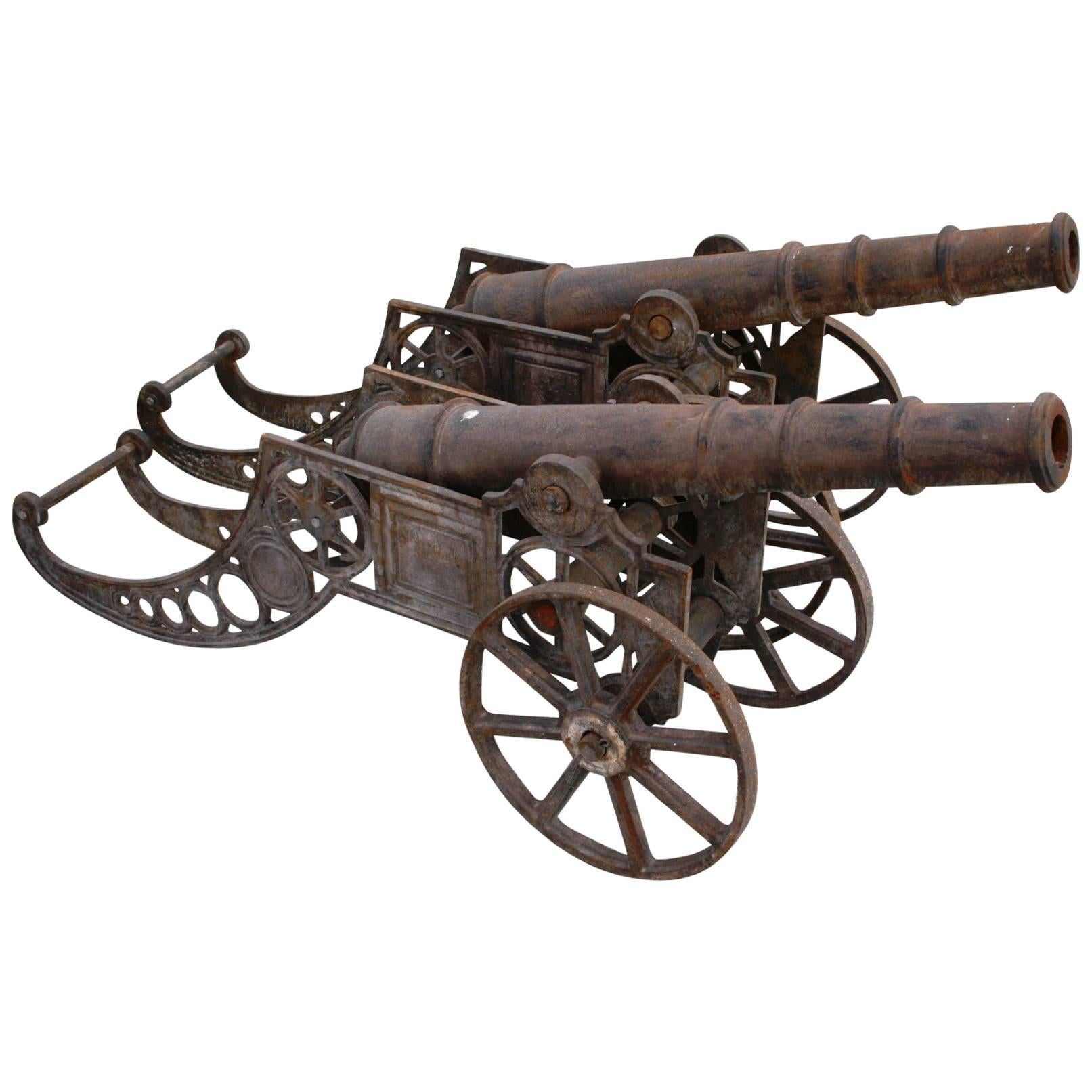 Pair of Cast Iron Cannon on Wheels Reproductions