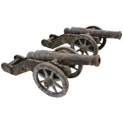 Pair of Cast Iron Cannon on Wheels Reproductions
