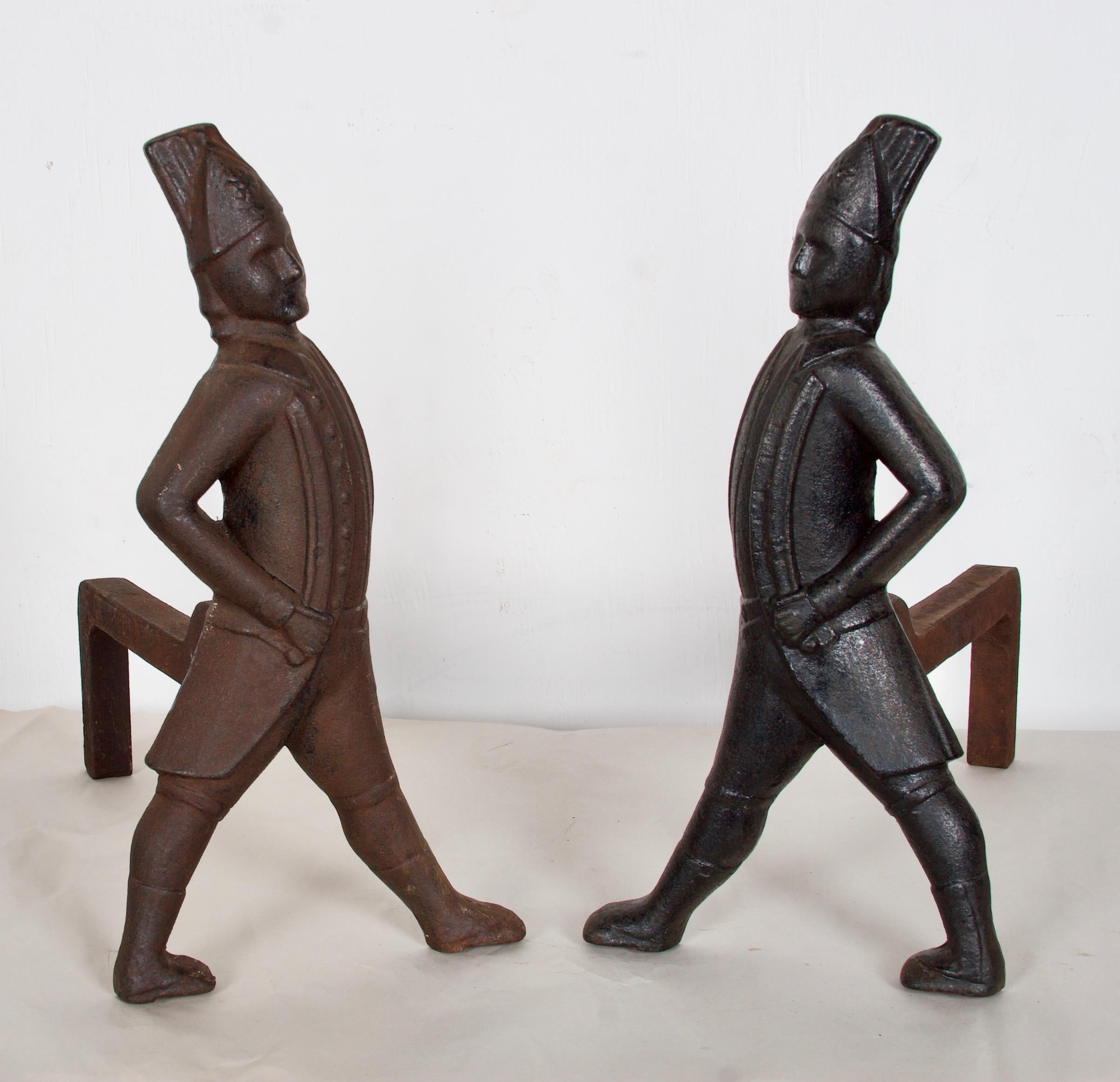 A wonderful pair of cast iron Andiorns, depicting Hessian soldiers.