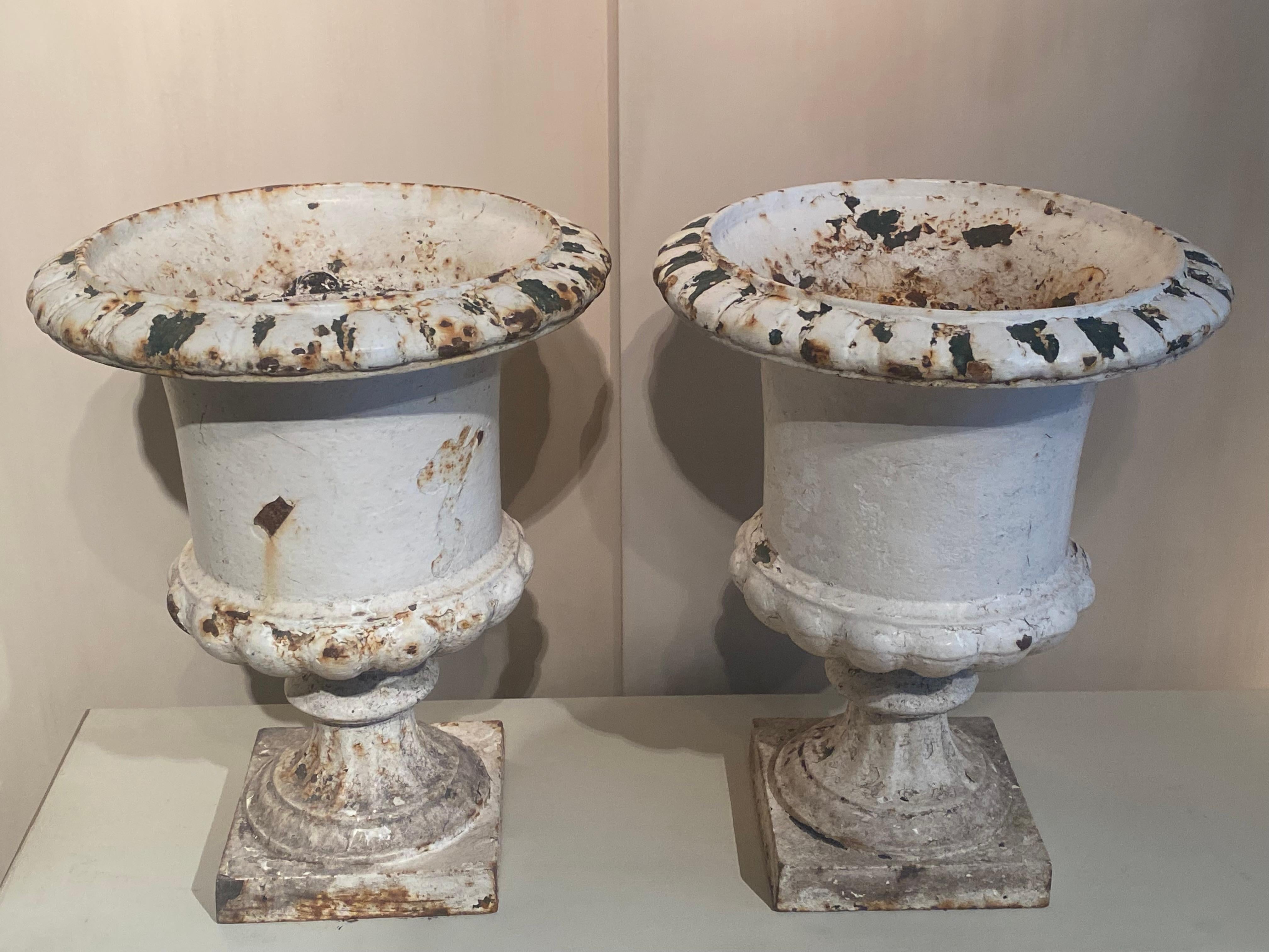 Patinated Pair of Cast Iron Garden Urns For Sale