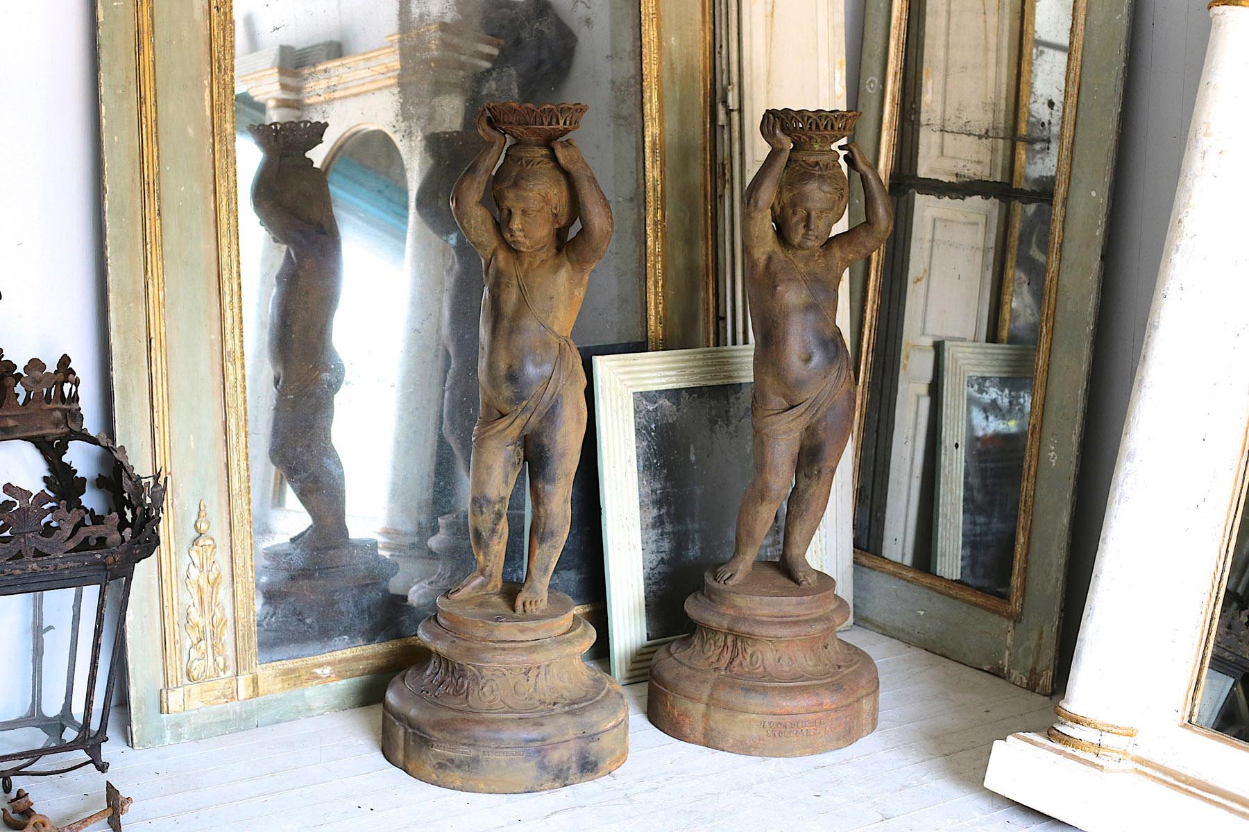 Pair of Cast Iron Girl on Plinths with a Stockholm Foundry Stamp In Good Condition For Sale In Poling, West Sussex