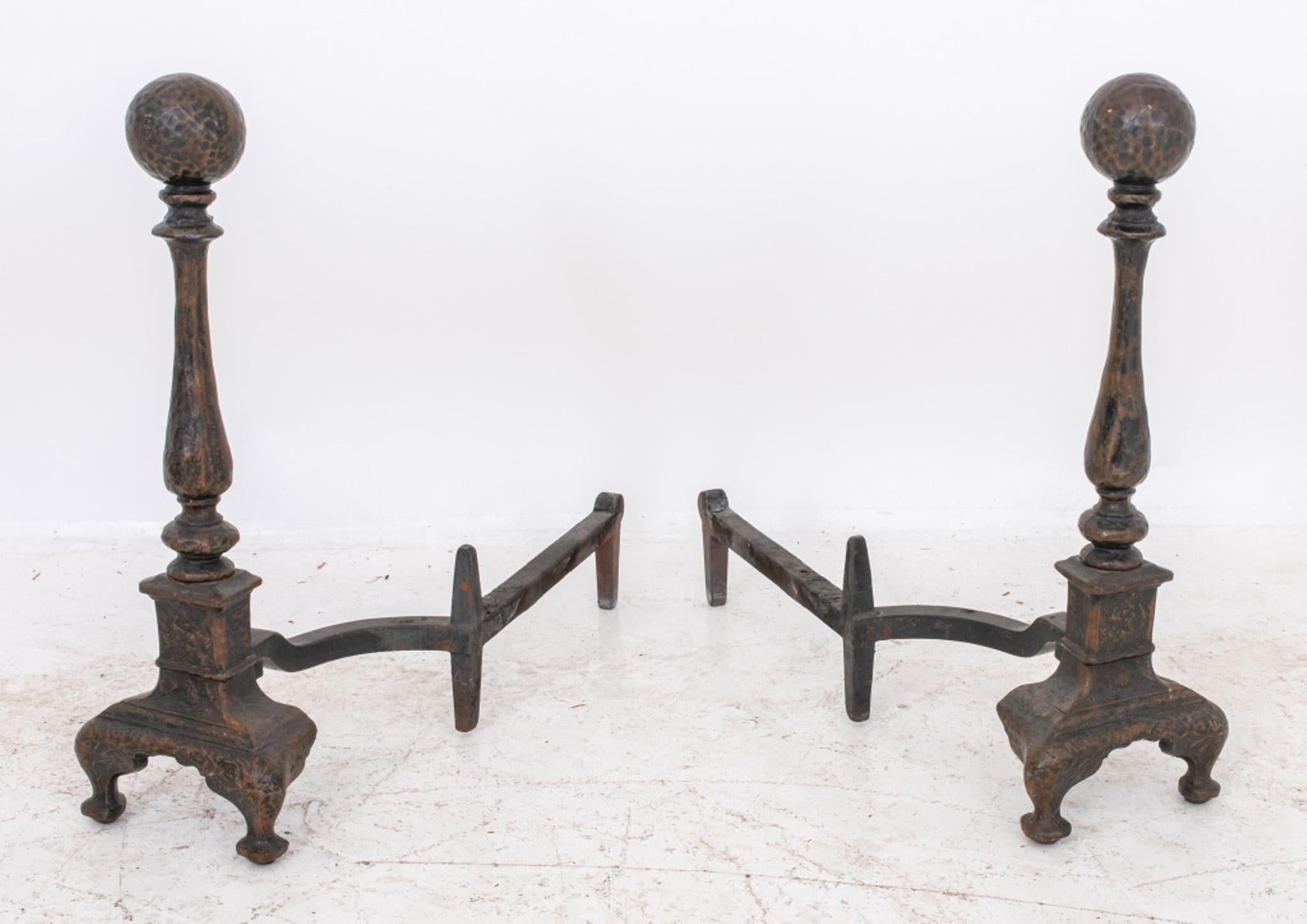 Pair of cast iron and brass andirons / chenets. In very good vintage condition. 
Dealer: S138XX.