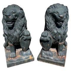 Retro Pair of Cast Iron Lion Statues