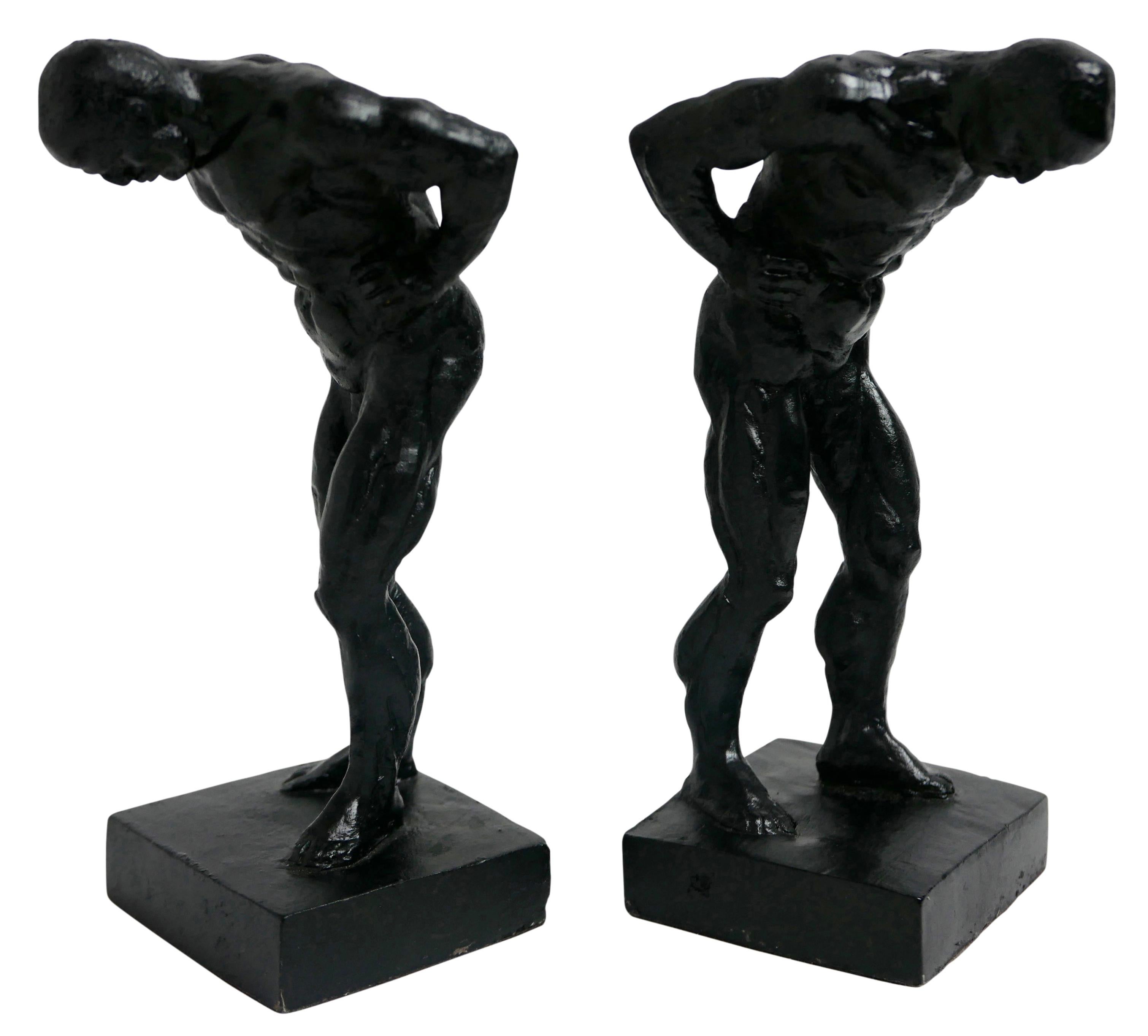 Pair of Cast Iron Muscular Male Figural Bookends In Good Condition In San Francisco, CA