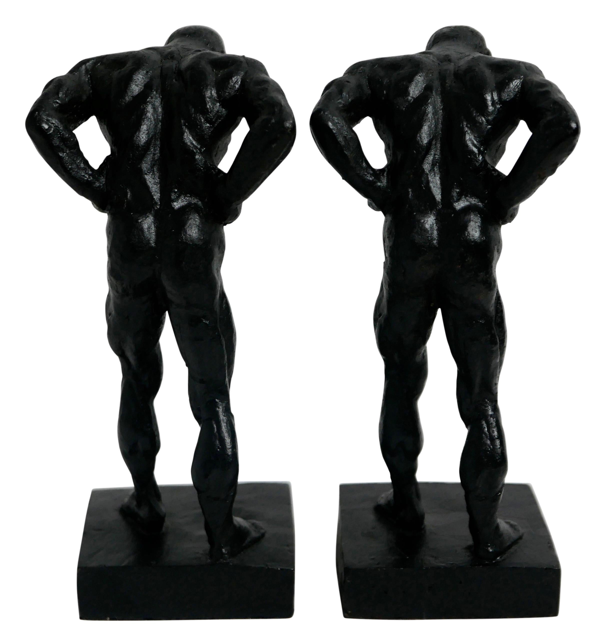 Pair of Cast Iron Muscular Male Figural Bookends 1