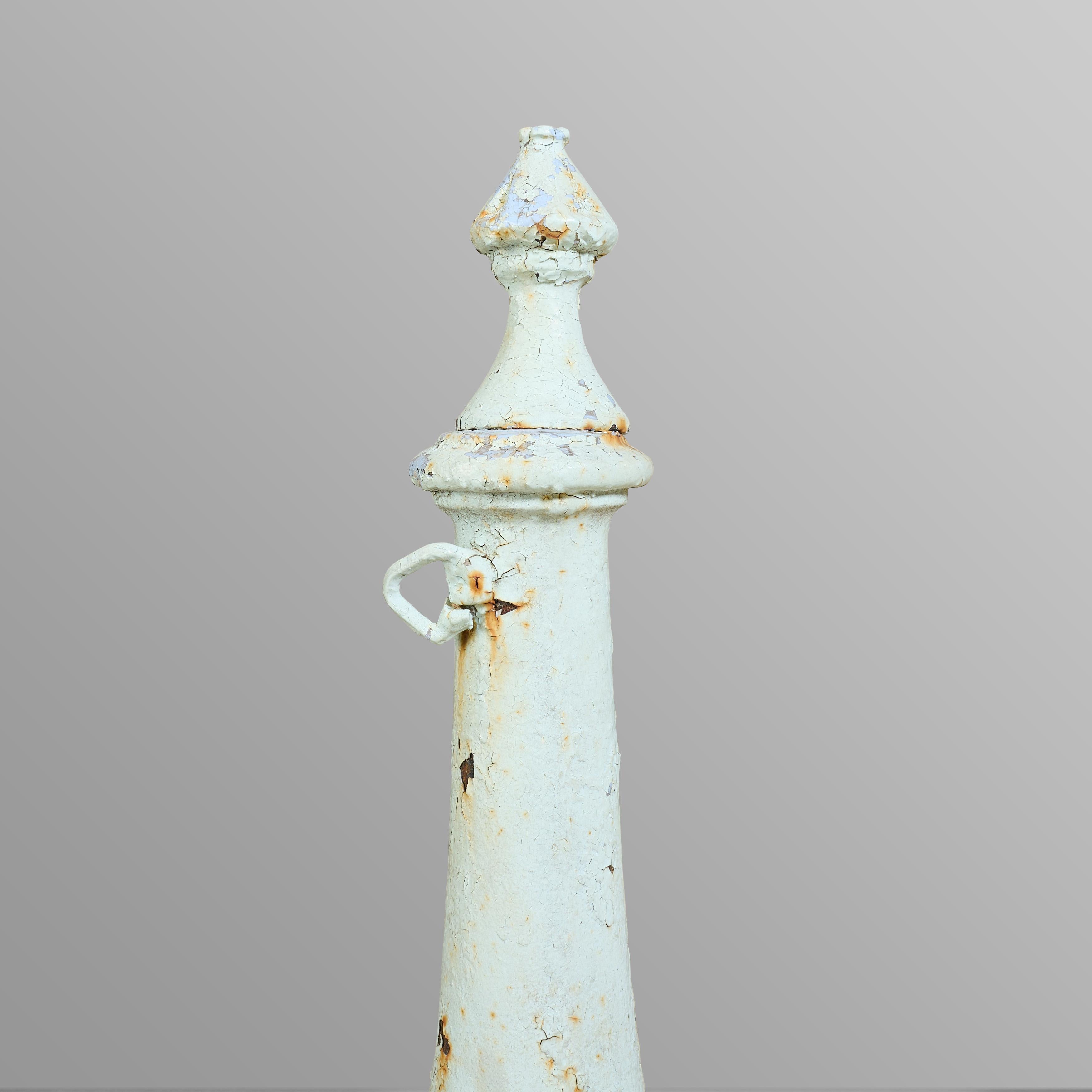 Pair of cast iron newel posts or finials. Interesting paint.