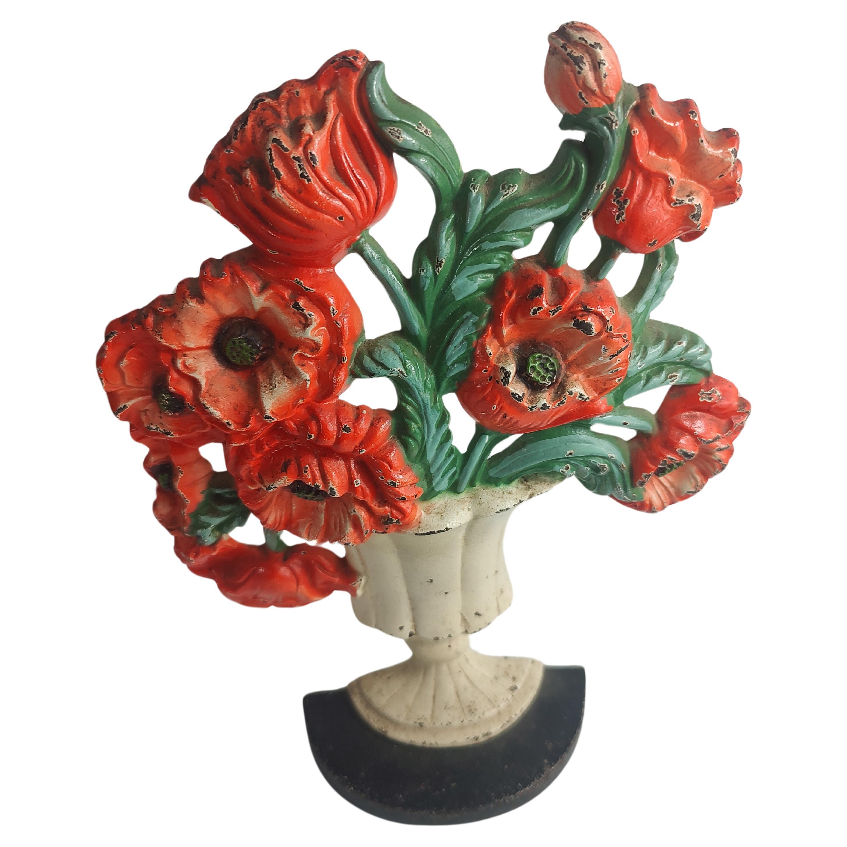 Par de topes de puerta Hubley de hierro fundido con pintura original C1935 Flores en un ramo Art Decó en venta