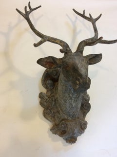 Pair of Cast Iron Stag/Buck Heads on Scroll and Foliate Backplate Estate Patina