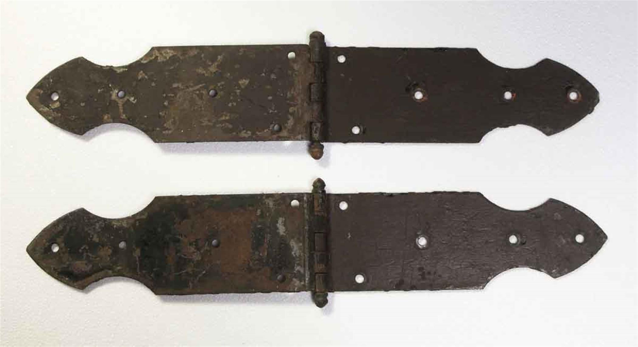 1940s cast iron strap door hinges with five knuckles. Some wear from age and use. Priced as a pair. Please note, this item is located in our Scranton, PA location.