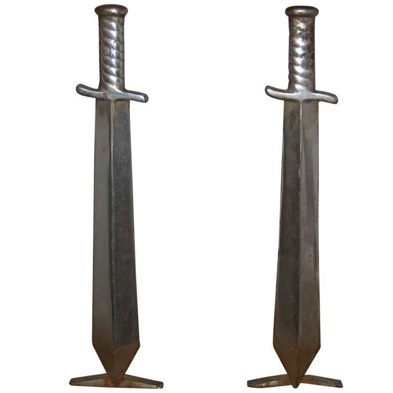Pair of Cast Iron Sword Andirons, circa 1910 For Sale