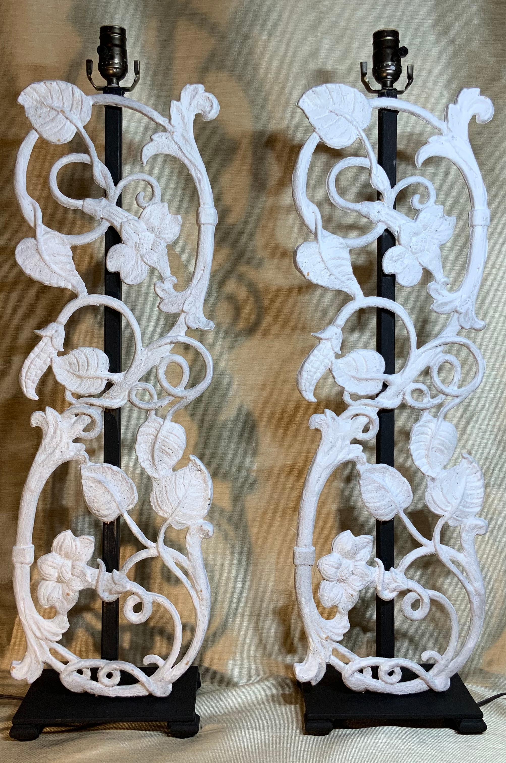 Elegant pair of table lamps made of cast iron with flowers and vines motif, hand painted in flat white, professionally mounted on a custom made steel base. Electrified and ready to light.
Great decorative pair for any room. Shades are not included.