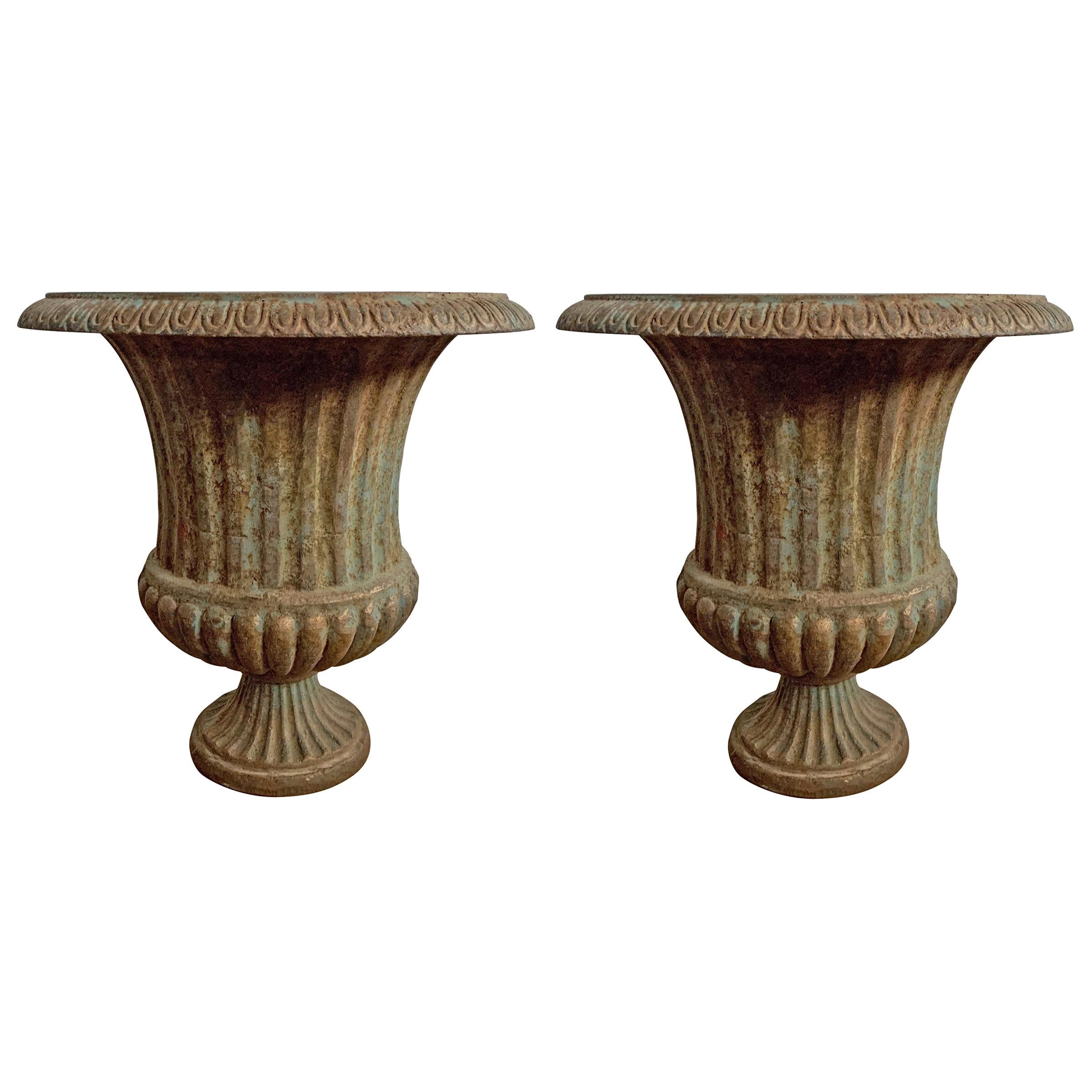 Pair of Cast Iron Urns