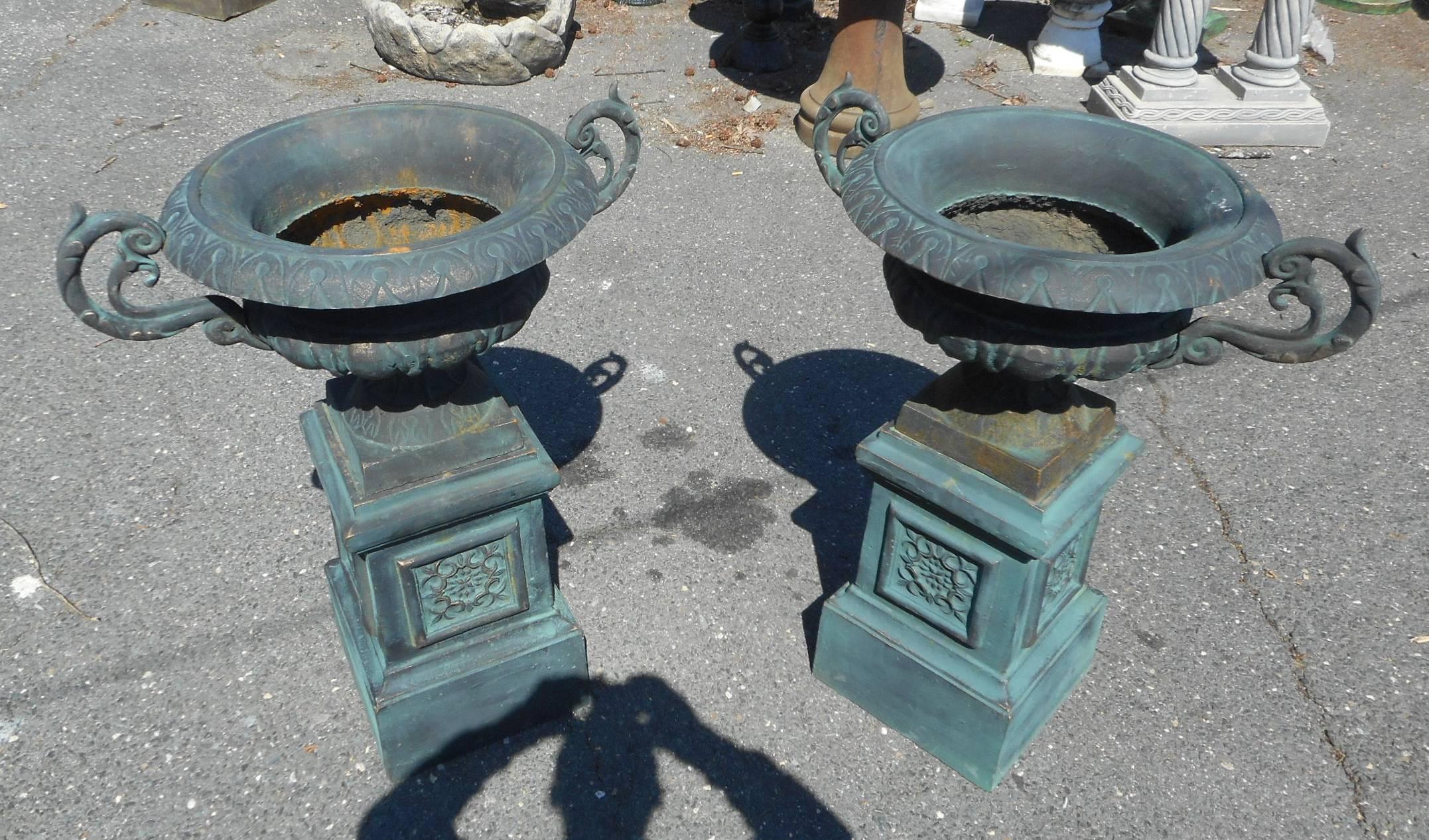 Renaissance Revival Pair of Cast Iron Urns on Pedestal Bases