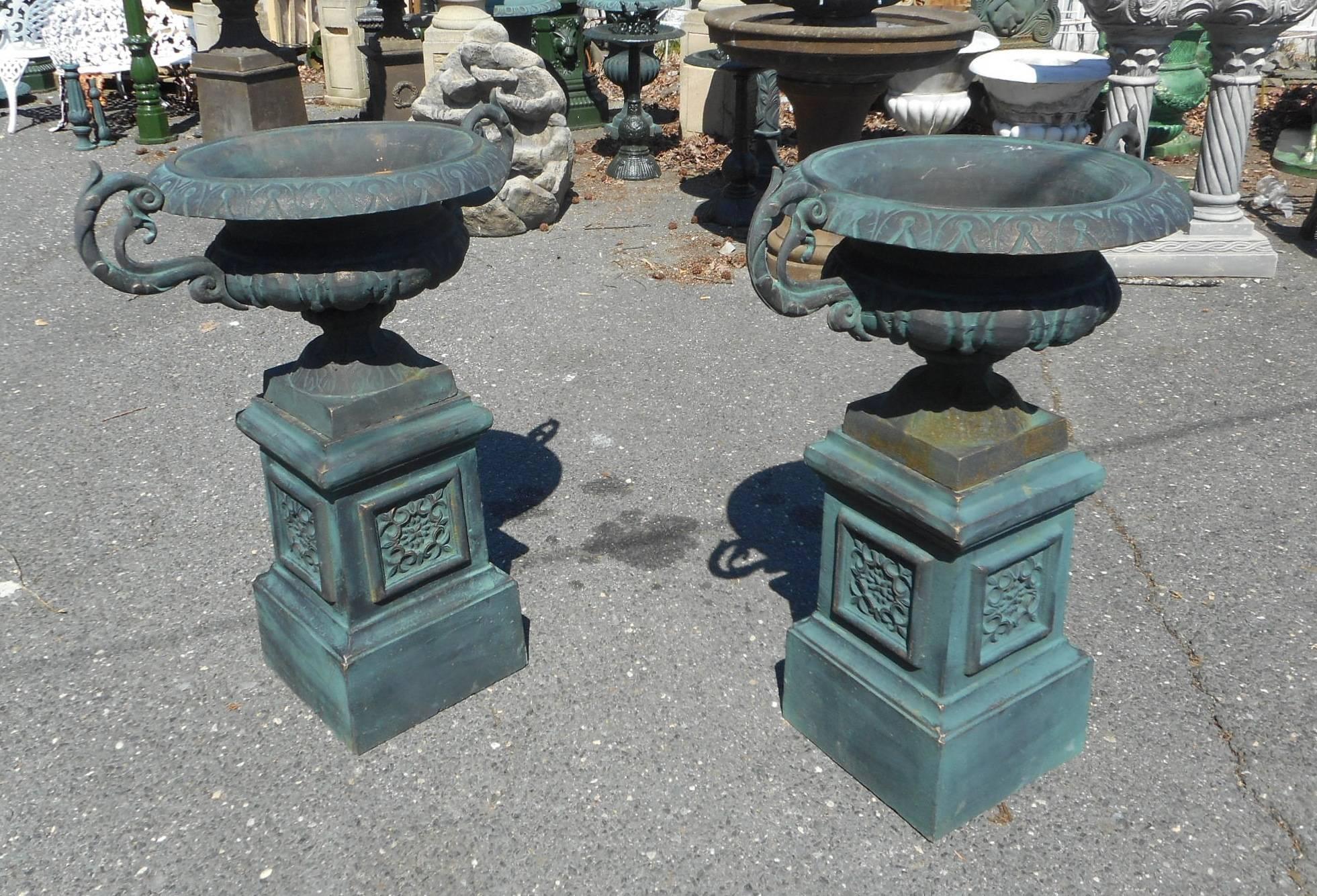 Pair of Cast Iron Urns on Pedestal Bases In Good Condition In Brooklyn, NY