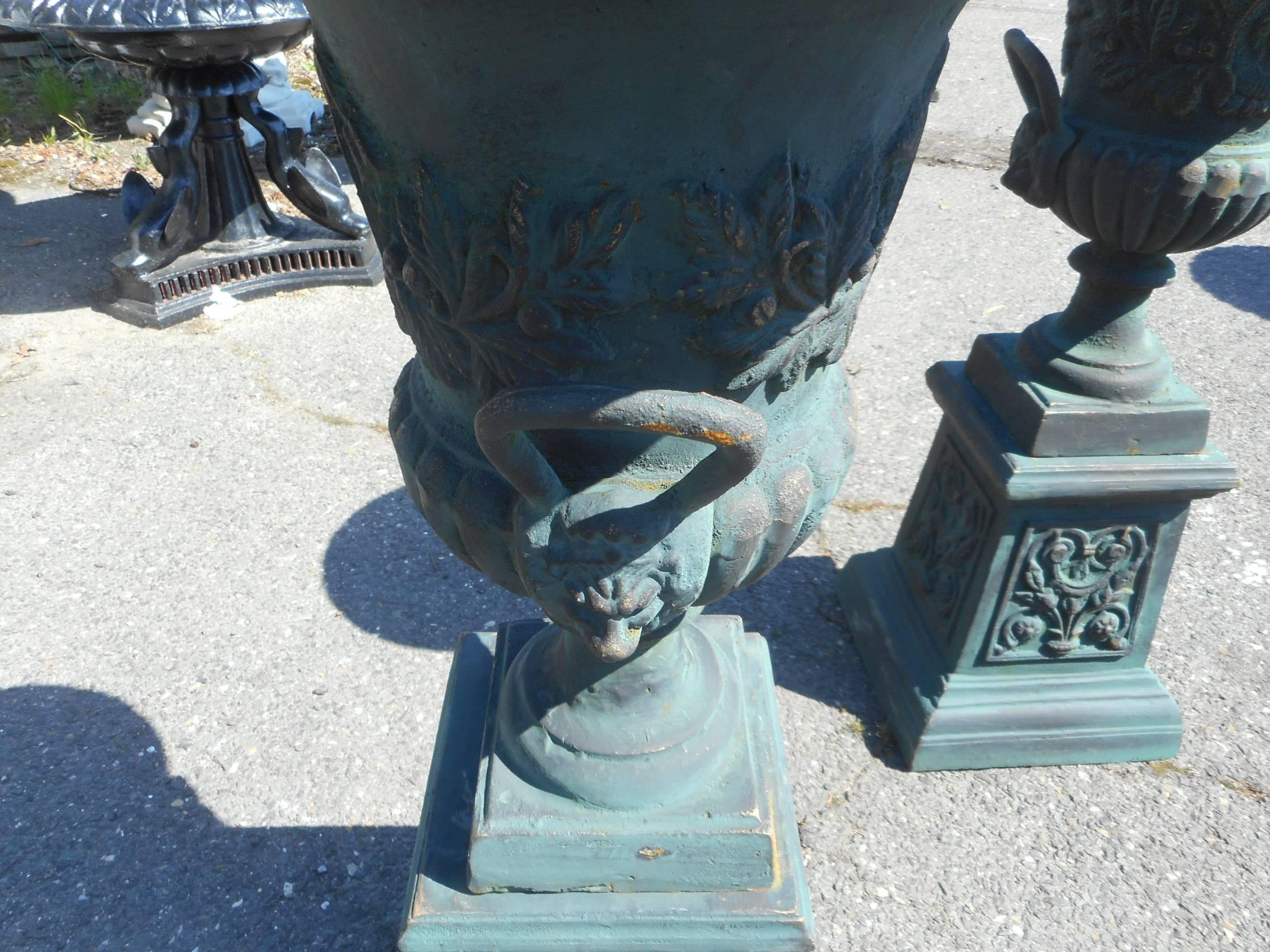 Pair of Cast Iron Urns on Pedestal Bases In Good Condition In Brooklyn, NY