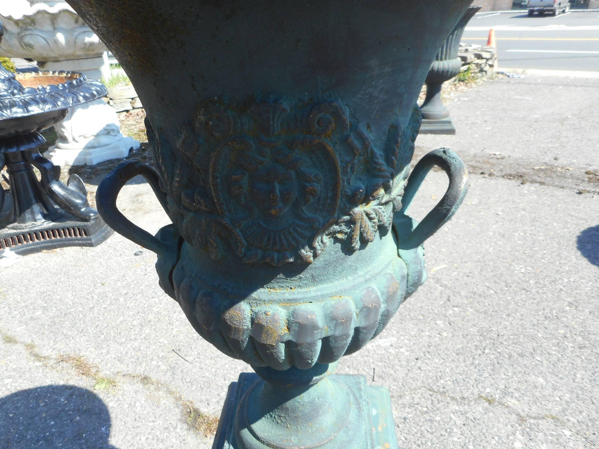 20th Century Pair of Cast Iron Urns on Pedestal Bases