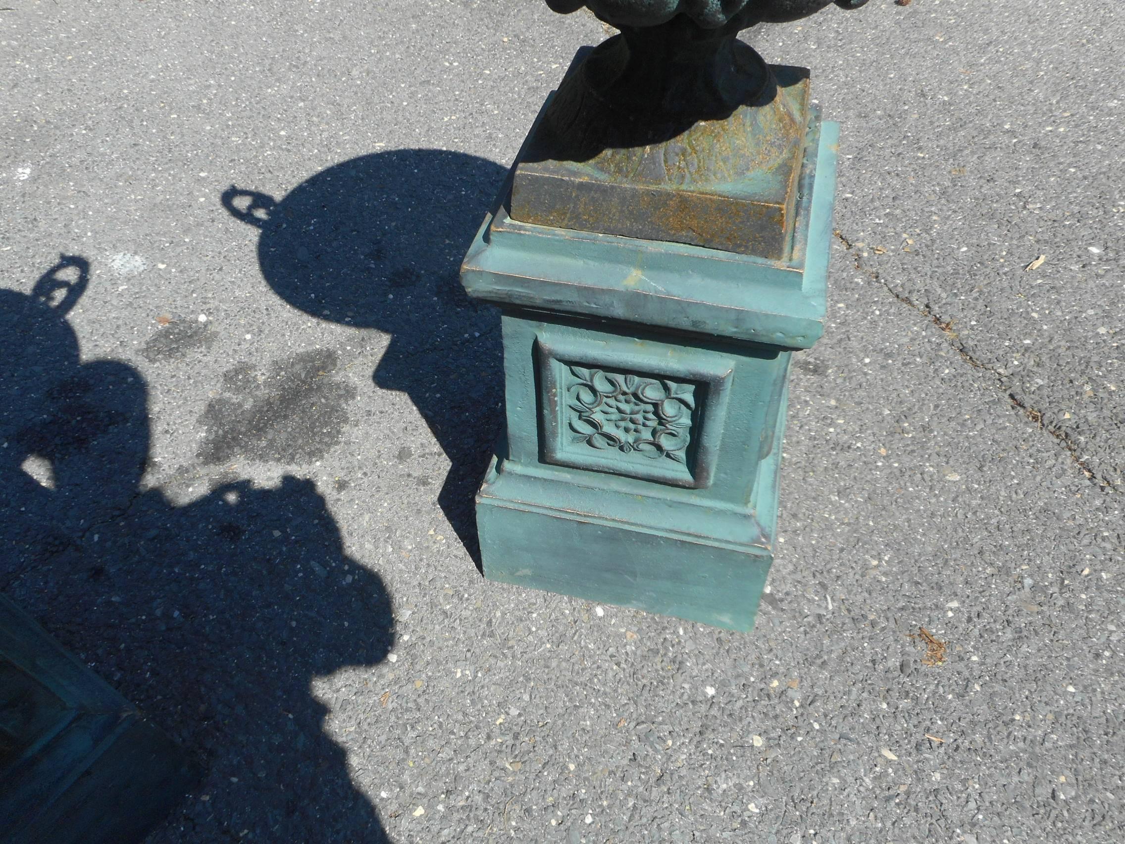 Pair of Cast Iron Urns on Pedestal Bases 4