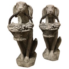 Pair of Cast Limestone French Hounds with Fruit Baskets