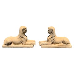 Pair of Cast Limestone Sphinxes