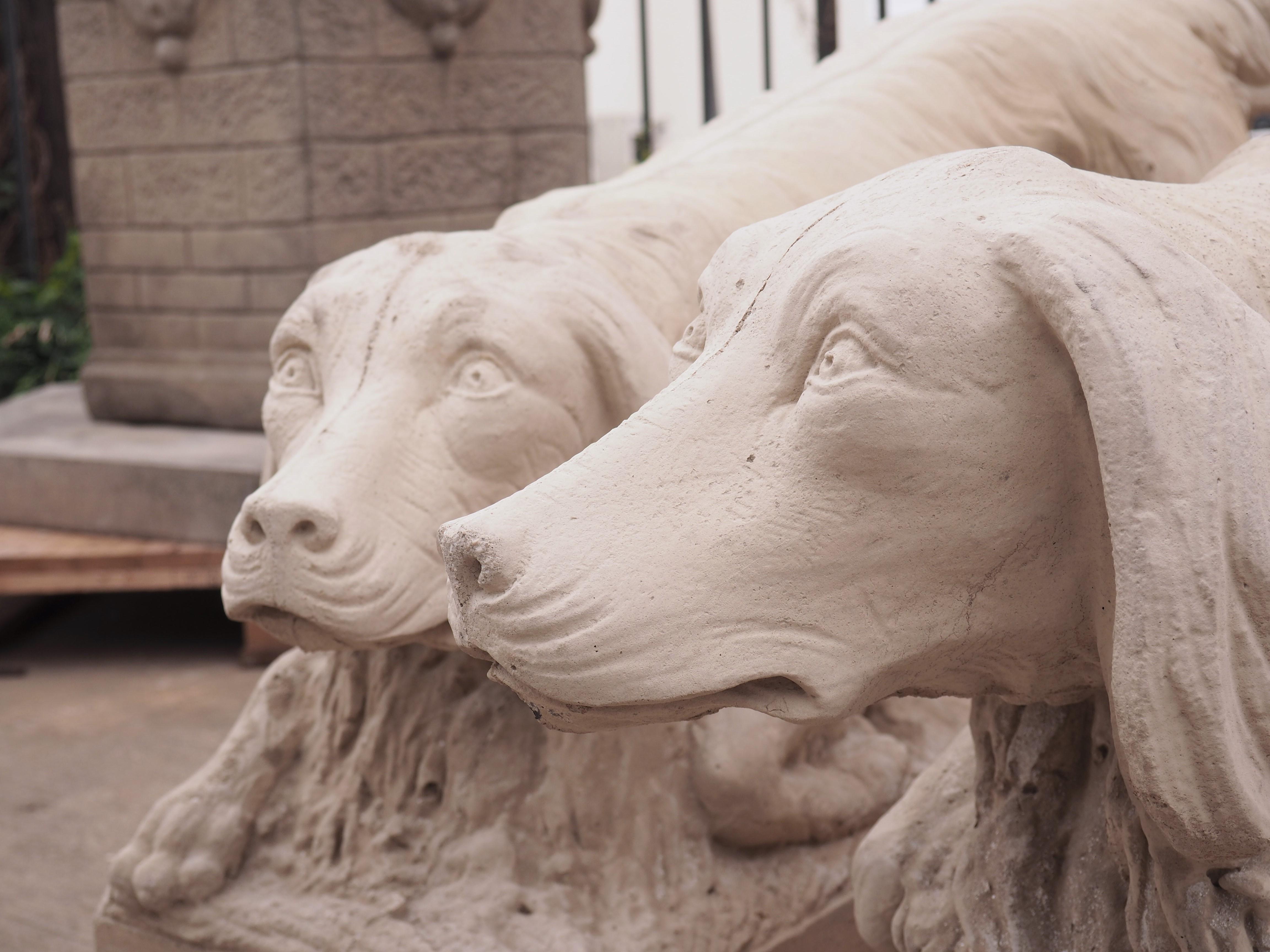 Pair of Cast Stone Dog Statues in a Light Sandstone Finish In Good Condition In Dallas, TX
