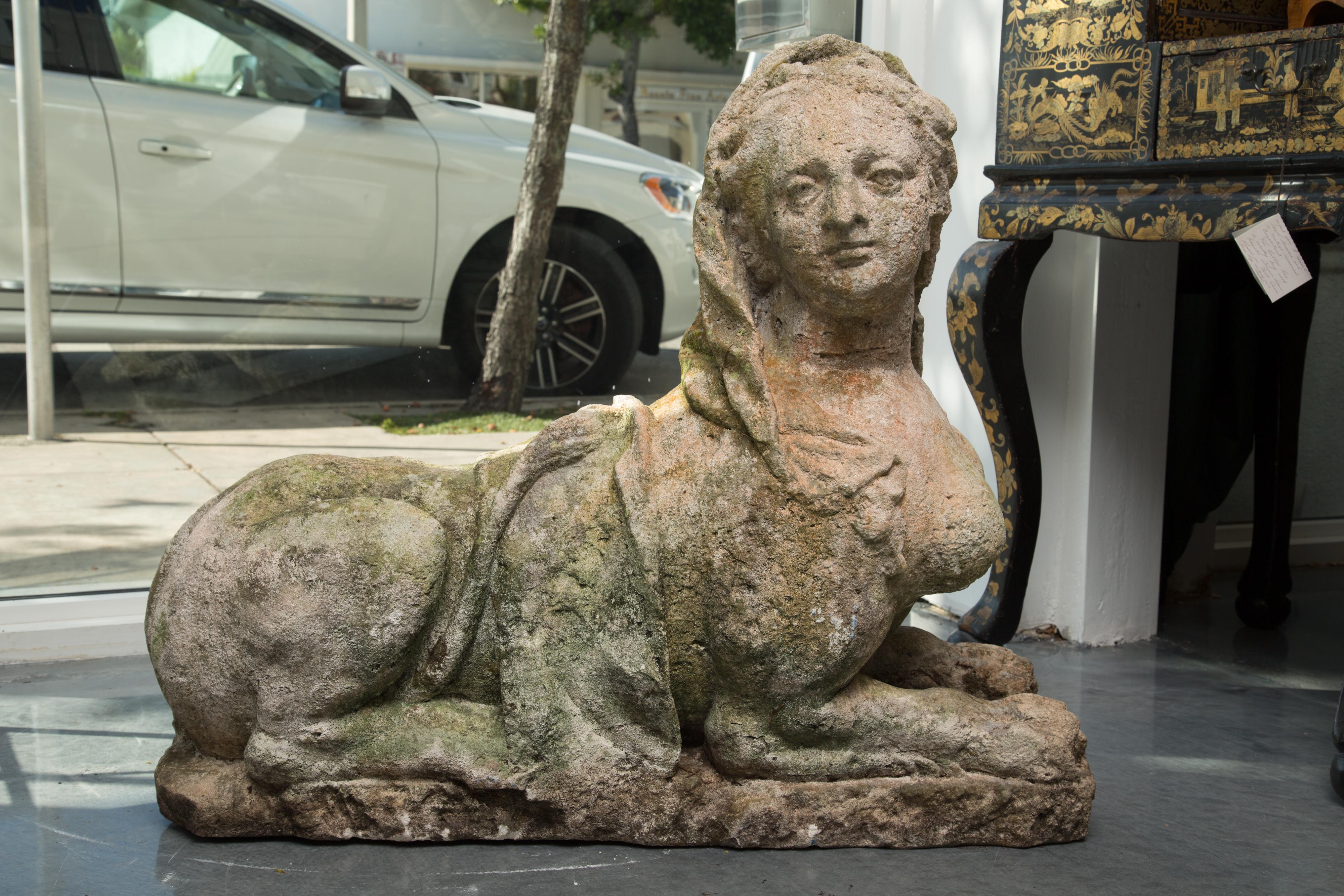 Pair of Cast Stone Egyptian Revival Sphinx Figures In Good Condition In WEST PALM BEACH, FL