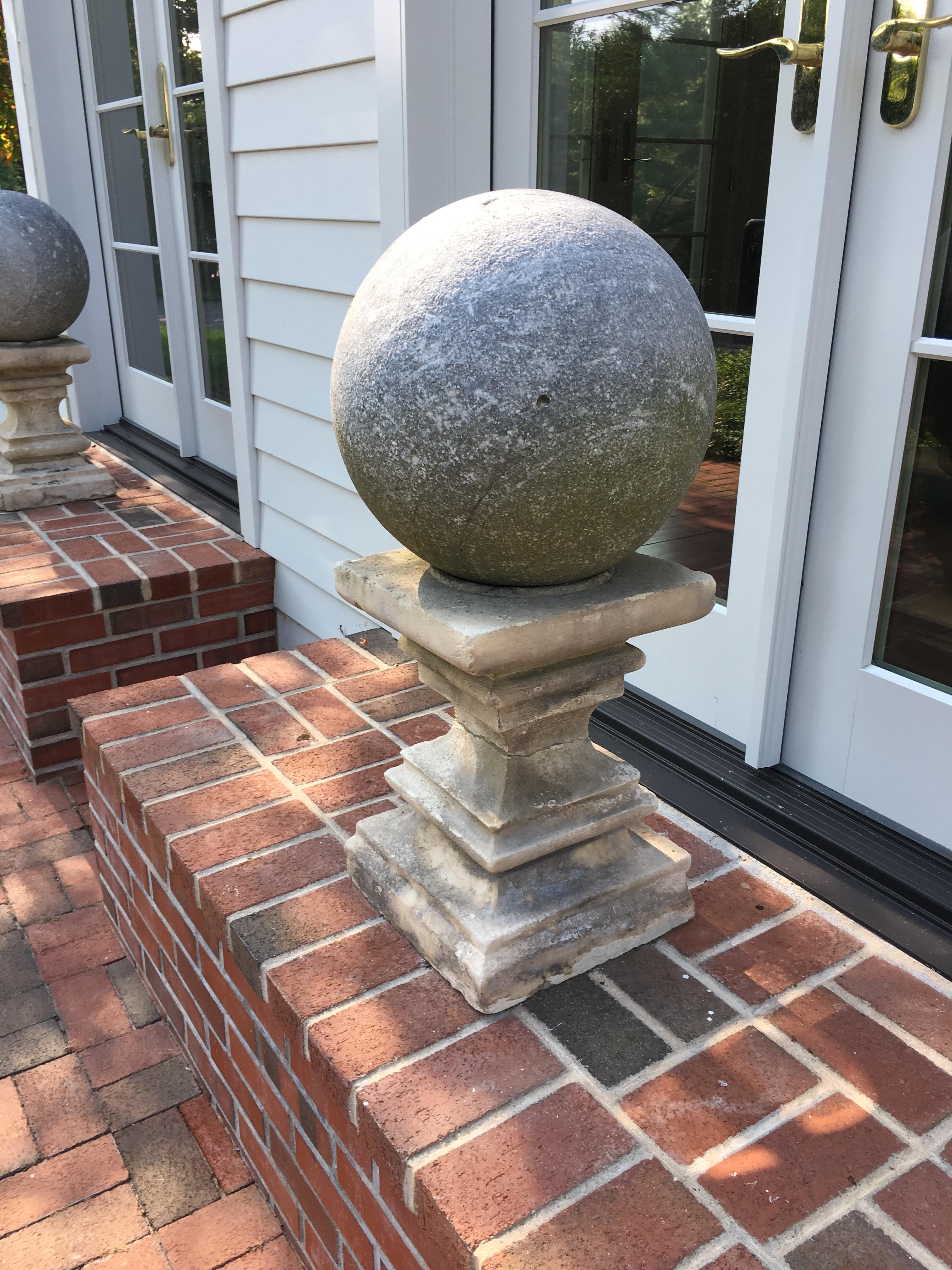 American Pair of Cast Stone Garden Balls Atop Stone Pedestals