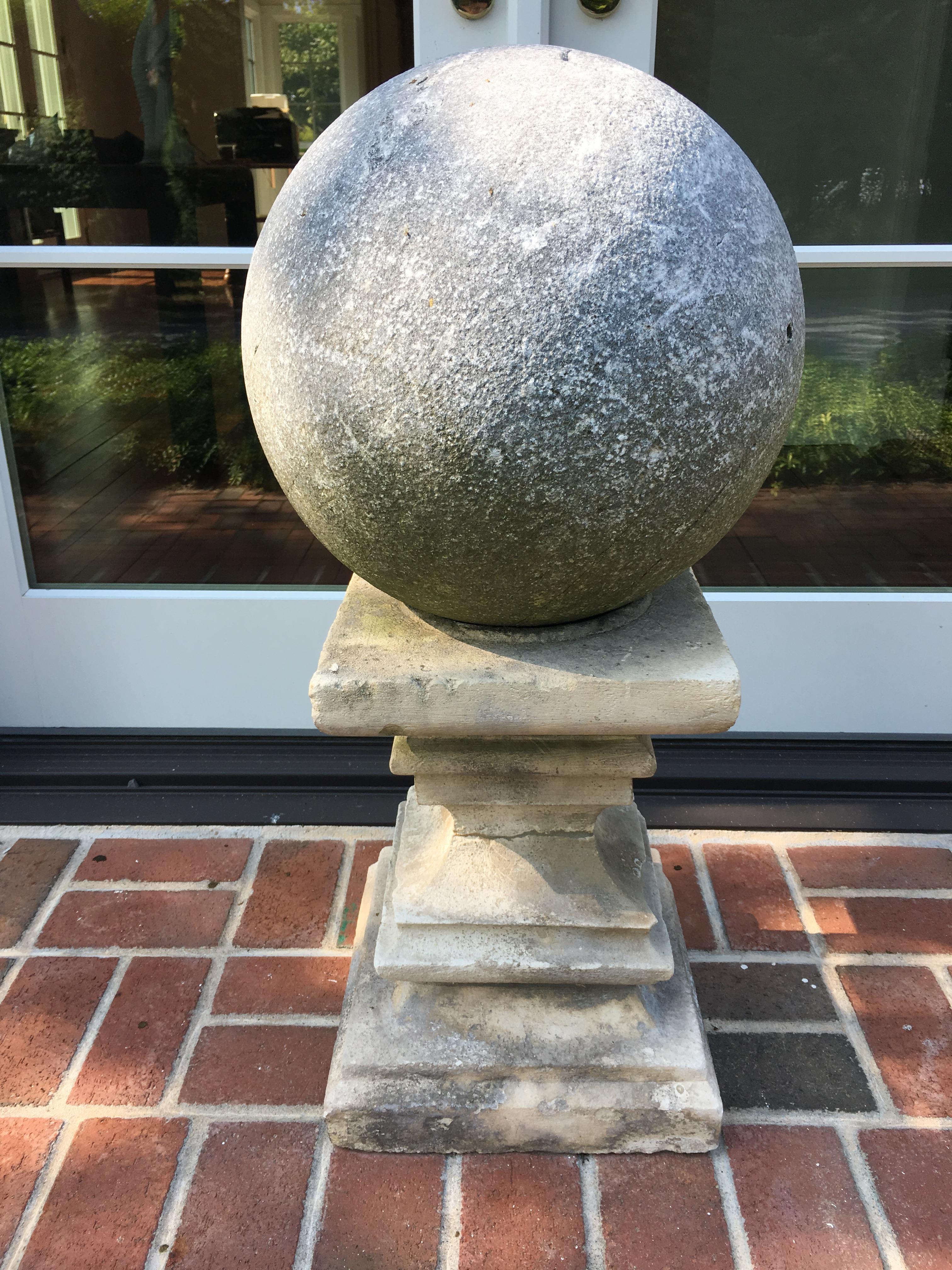 Pair of Cast Stone Garden Balls Atop Stone Pedestals In Good Condition In Southampton, NY
