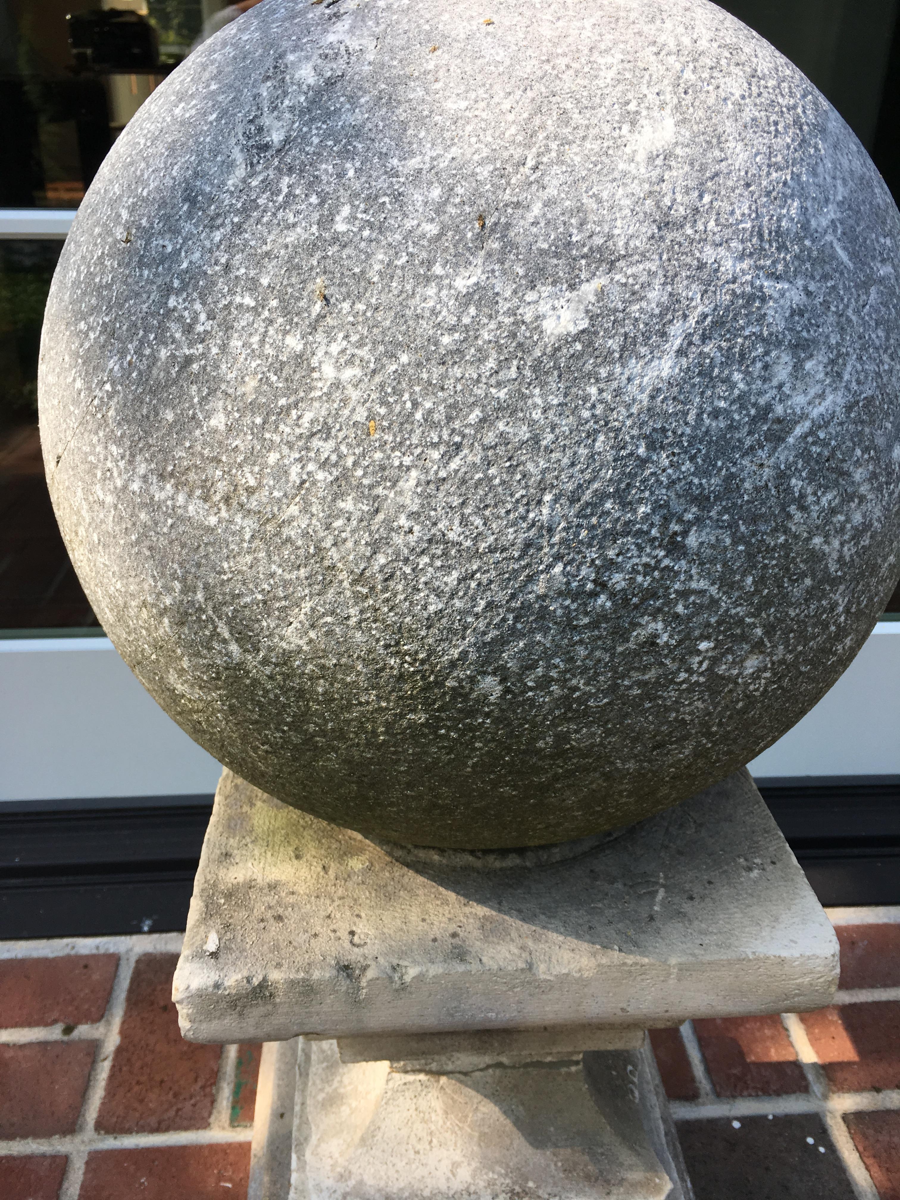 Contemporary Pair of Cast Stone Garden Balls Atop Stone Pedestals
