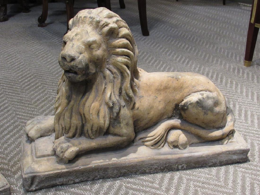 Pair of Cast Stone Garden Lions, Recumbent Lions on Plinth Bases In Good Condition In Plainview, NY