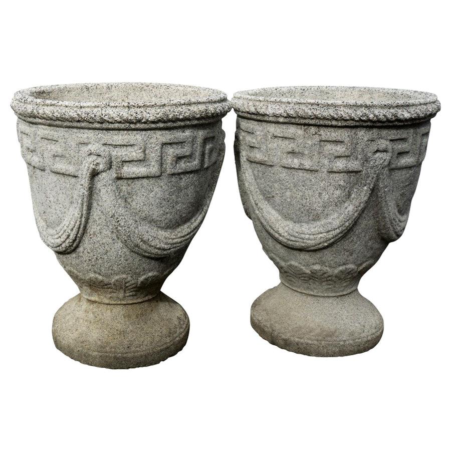 Pair of Cast Stone Greek Key and Swag Relief Urns For Sale