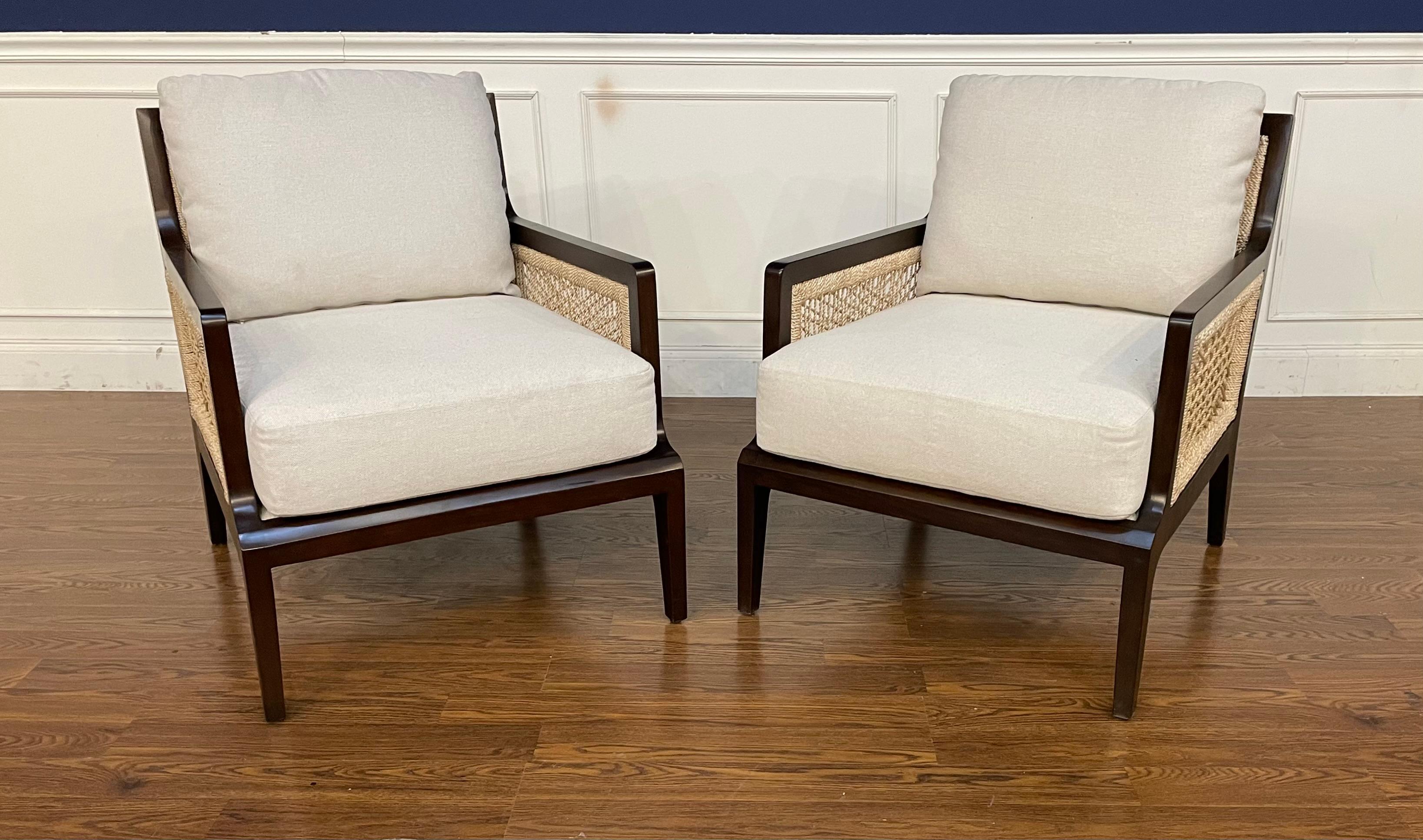 This is a pair (2) of Pasadena Lounge Chairs by Century Furniture.  They are versatile chairs which feature natural Abaca woven panels on the sides and back inserts in light brown finished mahogany frames.  They have loose seat and back cushions
